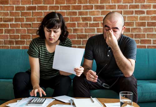 couple managing debt