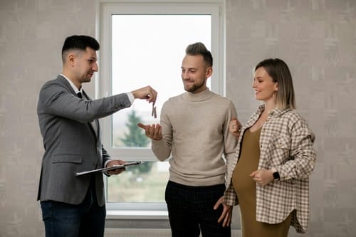 real-estate-agent-handing-the-key